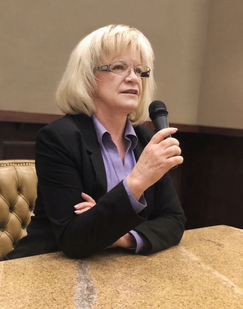 Rebecca Arnold speaking at a public meeting